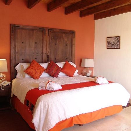 Casa Del Tio Hotel Boutique San Miguel de Allende Pokój zdjęcie A bedroom at Hotel San Cristóbal