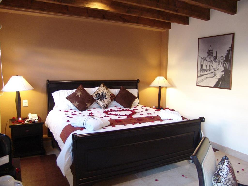Casa Del Tio Hotel Boutique San Miguel de Allende Pokój zdjęcie A bedroom at the Inn at the Quinta Real
